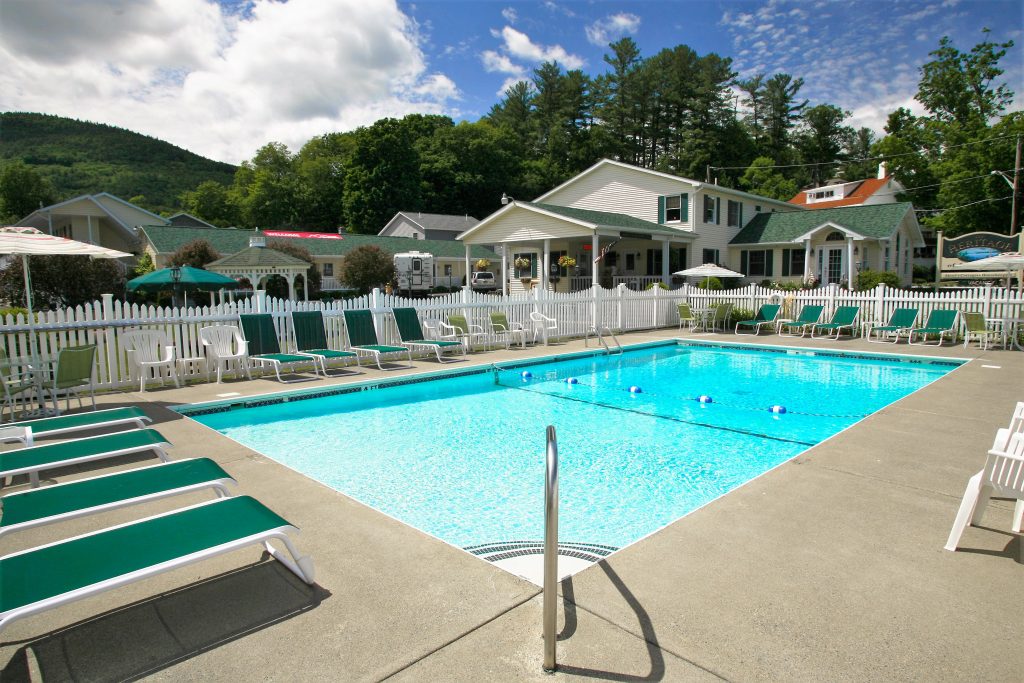 Pool with chairs around pool
